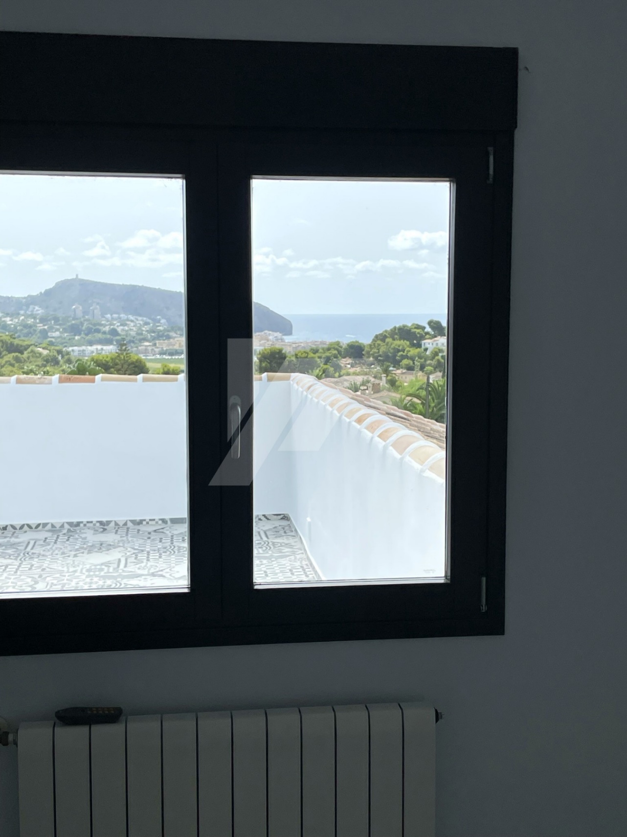 Villa de estilo mediterránea con vistas al mar en venta en Moraira, Costa Blanca.