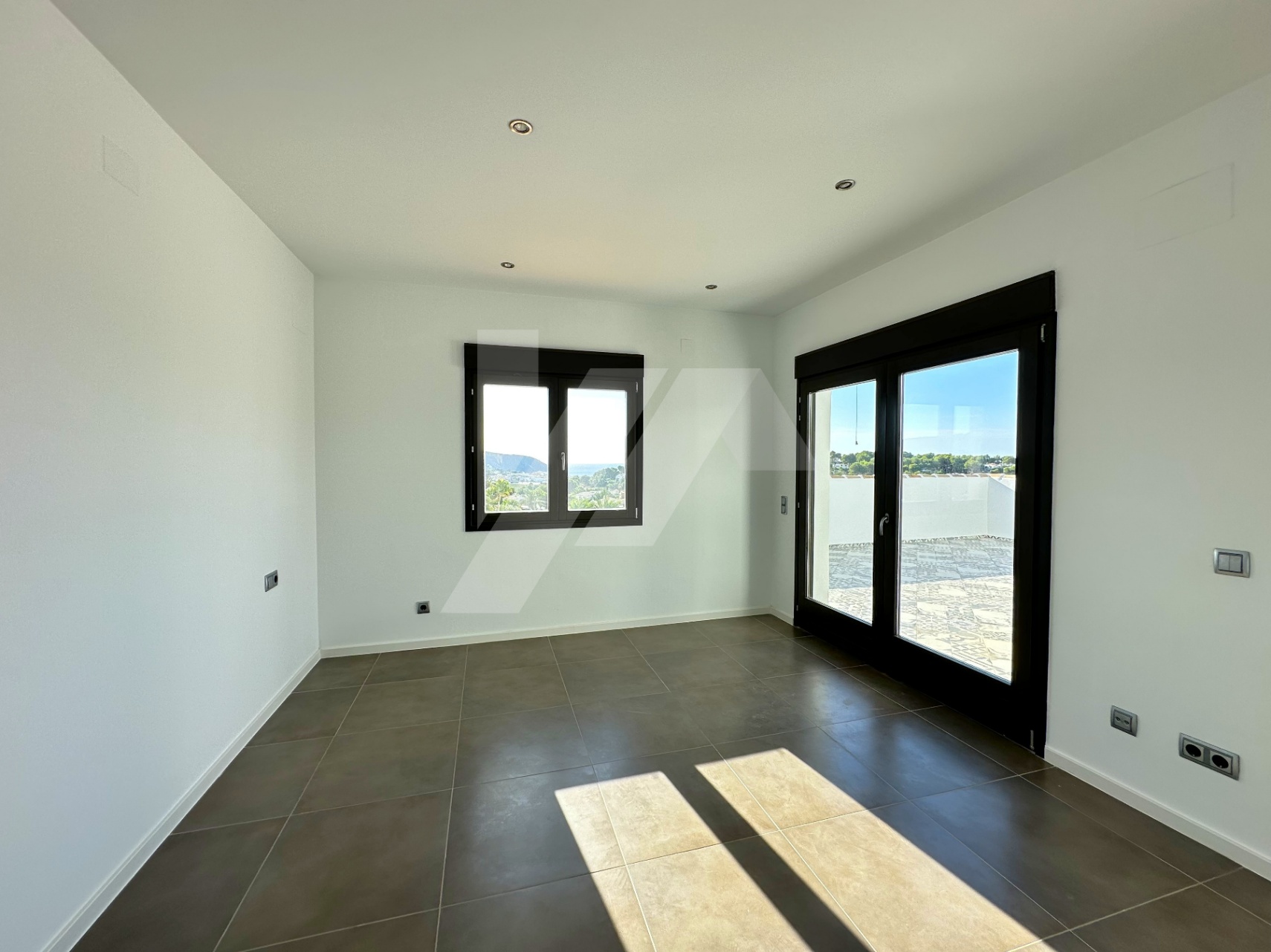 Villa de estilo mediterránea con vistas al mar en venta en Moraira, Costa Blanca.